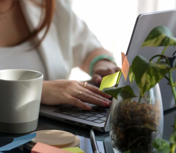 Marketing professional working on laptop